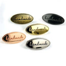 Emmaline Metal Bag Oval Label 'Handmade'