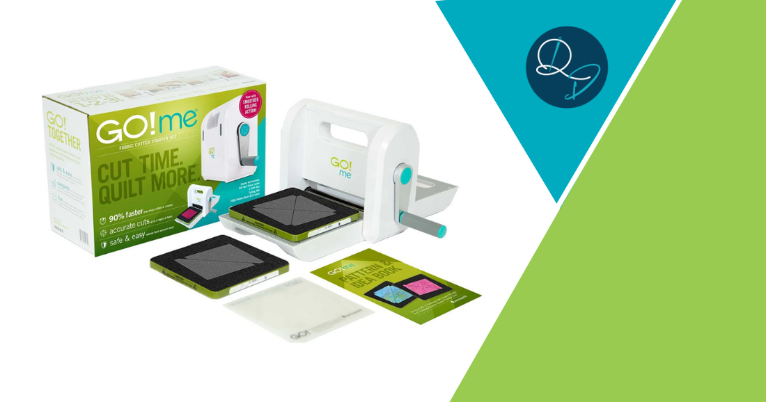 AccuQuilt GO! Me fabric cutter starter set with machine, cutting die, mat, and pattern idea book, with the tagline 'Cut Time. Quilt More', on a teal and green branded background with the Quilt Direct logo