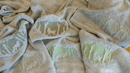 Finished embroidered hand towels created in the Quilt Direct BERNINA Studio using the BERNINA 700 Embroidery Machine