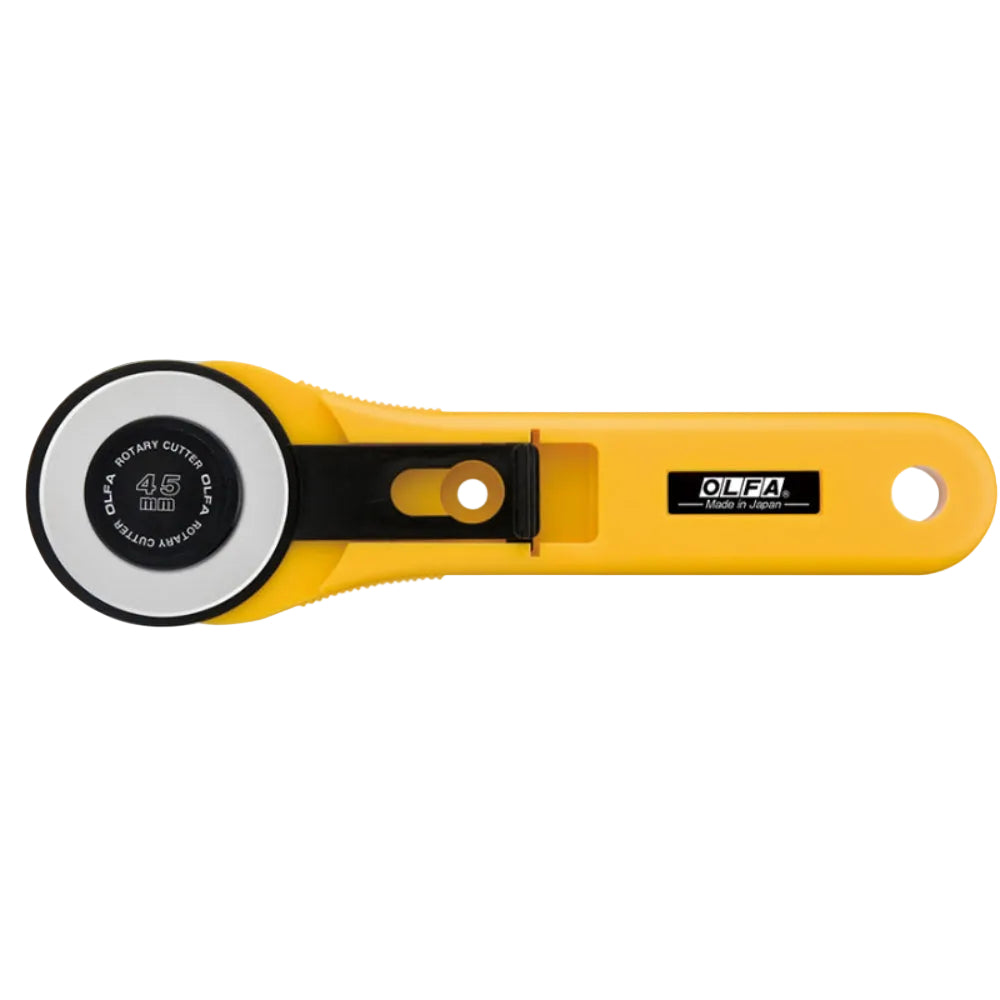 Yellow rotary cutter on a white background
