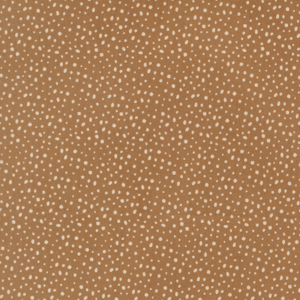 Gingerbread Lane patterned cotton quilting fabric by Moda