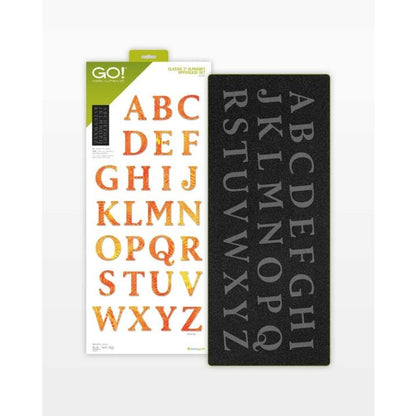 Two letter boards, one with colorful letters and the other with black letters on a white background.