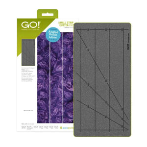 AccuQuilt GO! Small Strip Cutter 1½" fabric cutting die (55944) in retail packaging, featuring angled guide lines for 30°, 45°, and 60° cuts