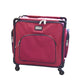Red suitcase with black accents and 'Tutto' branding on a white background