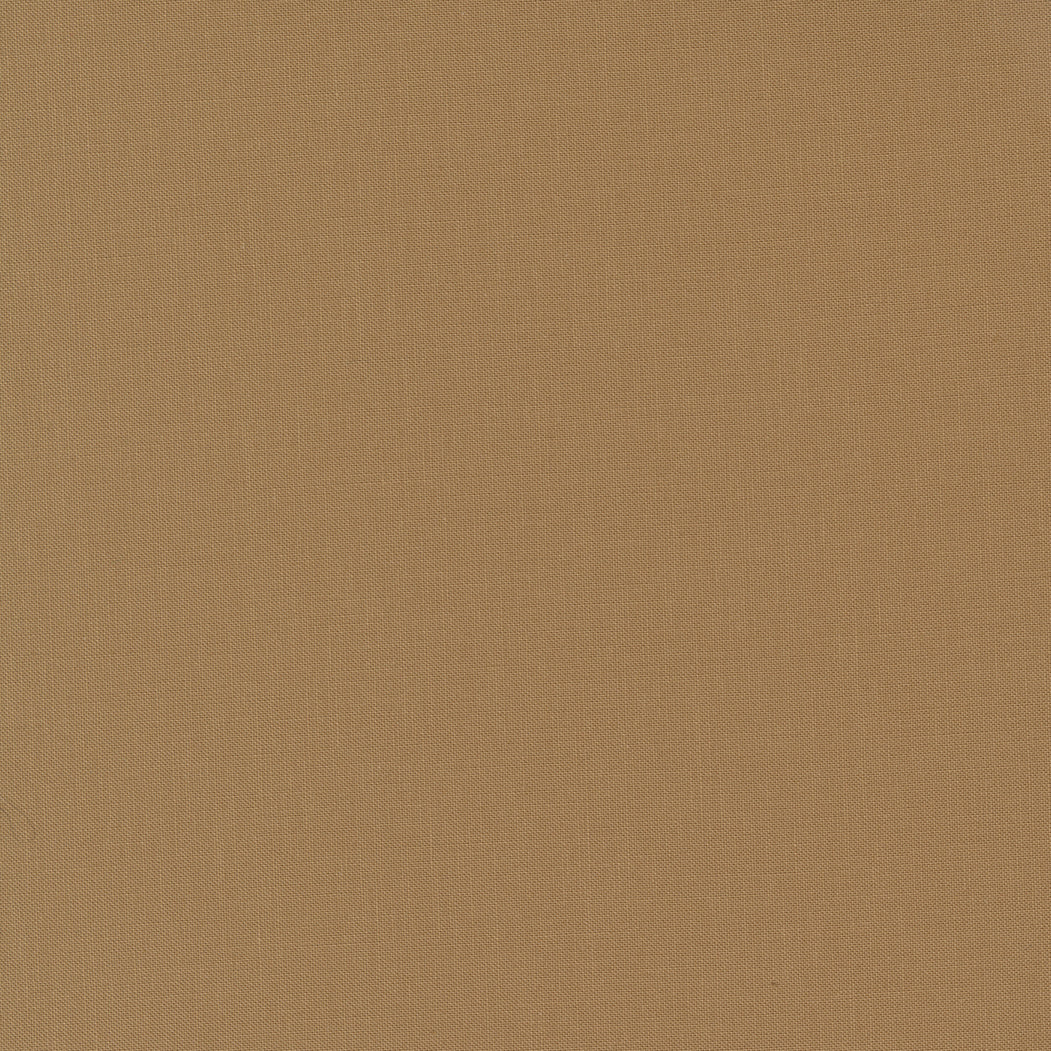 Gingerbread Lane patterned cotton quilting fabric by Moda
