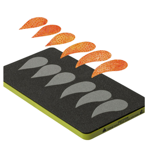 AccuQuilt GO! Feathers die at an angle with six orange dotted feather shapes cut and lifted above it