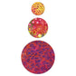 AccuQuilt GO! Circle fabric shapes in yellow dotted, pink ringed and red streaked batik prints