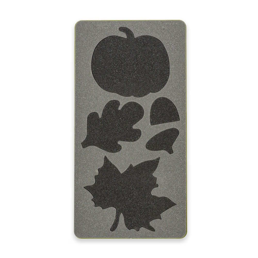 AccuQuilt GO! Fall Medley cutting die shown flat with pumpkin, oak leaf, acorn and maple leaf shapes