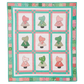AccuQuilt GO! Sunbonnet Sue nine-block sampler quilt in pink and green with a scrappy checkerboard border