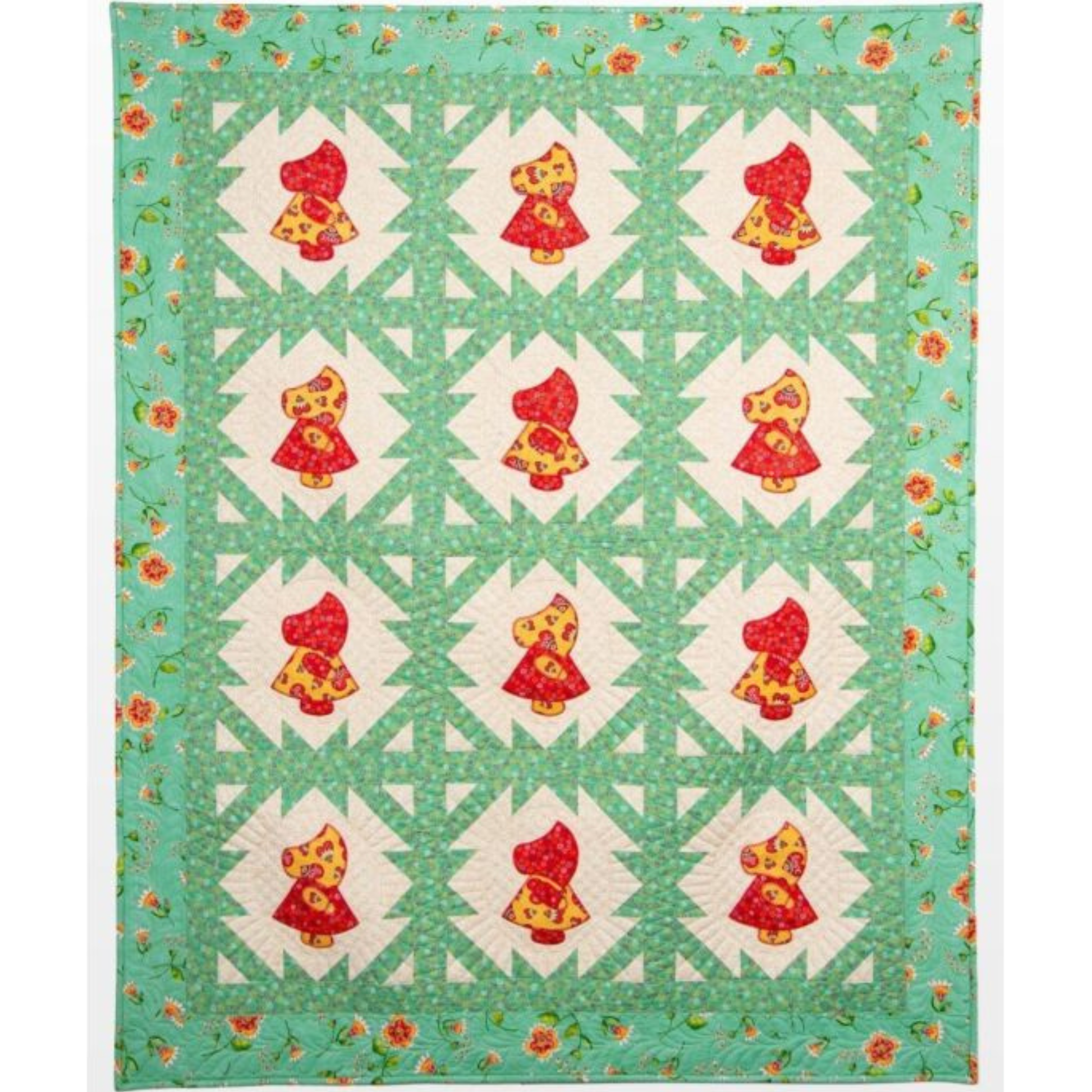 AccuQuilt GO! Sunbonnet Sue red and yellow blocks set in a green pieced star quilt with a floral border