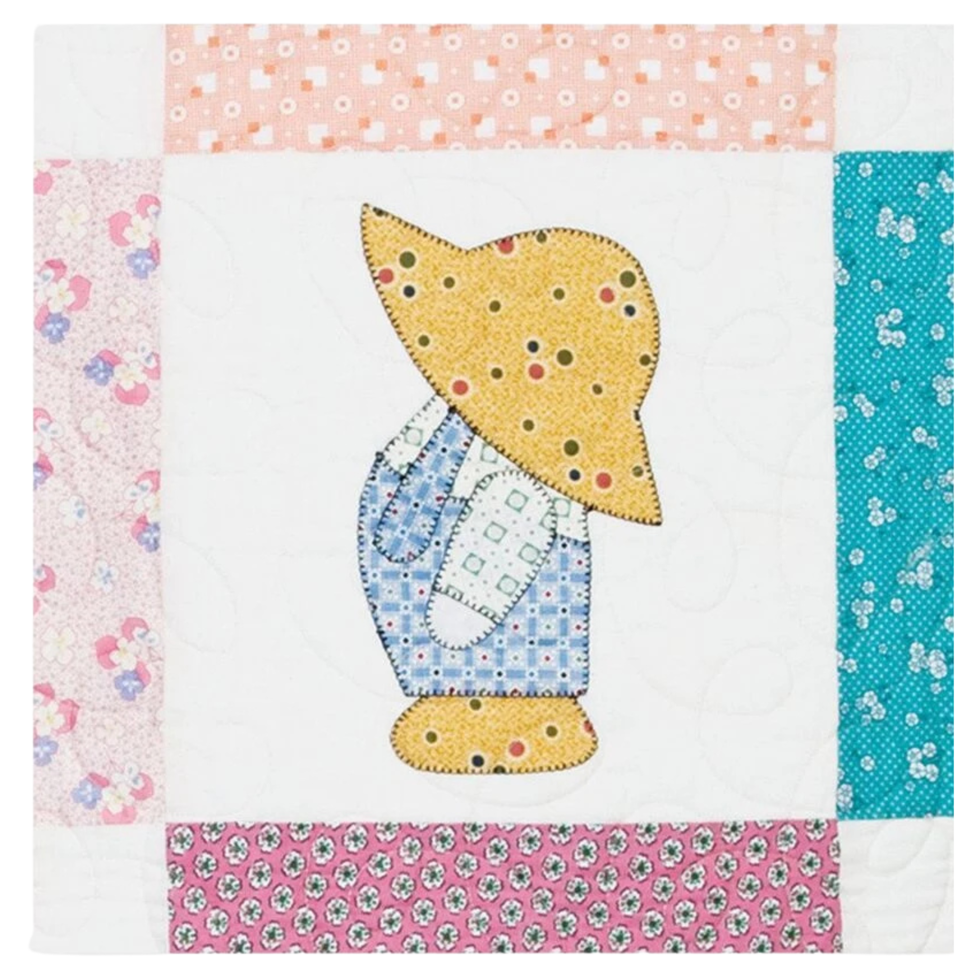 AccuQuilt GO! Overall Sam block in yellow polka dot hat and blue check overalls with gingham bib