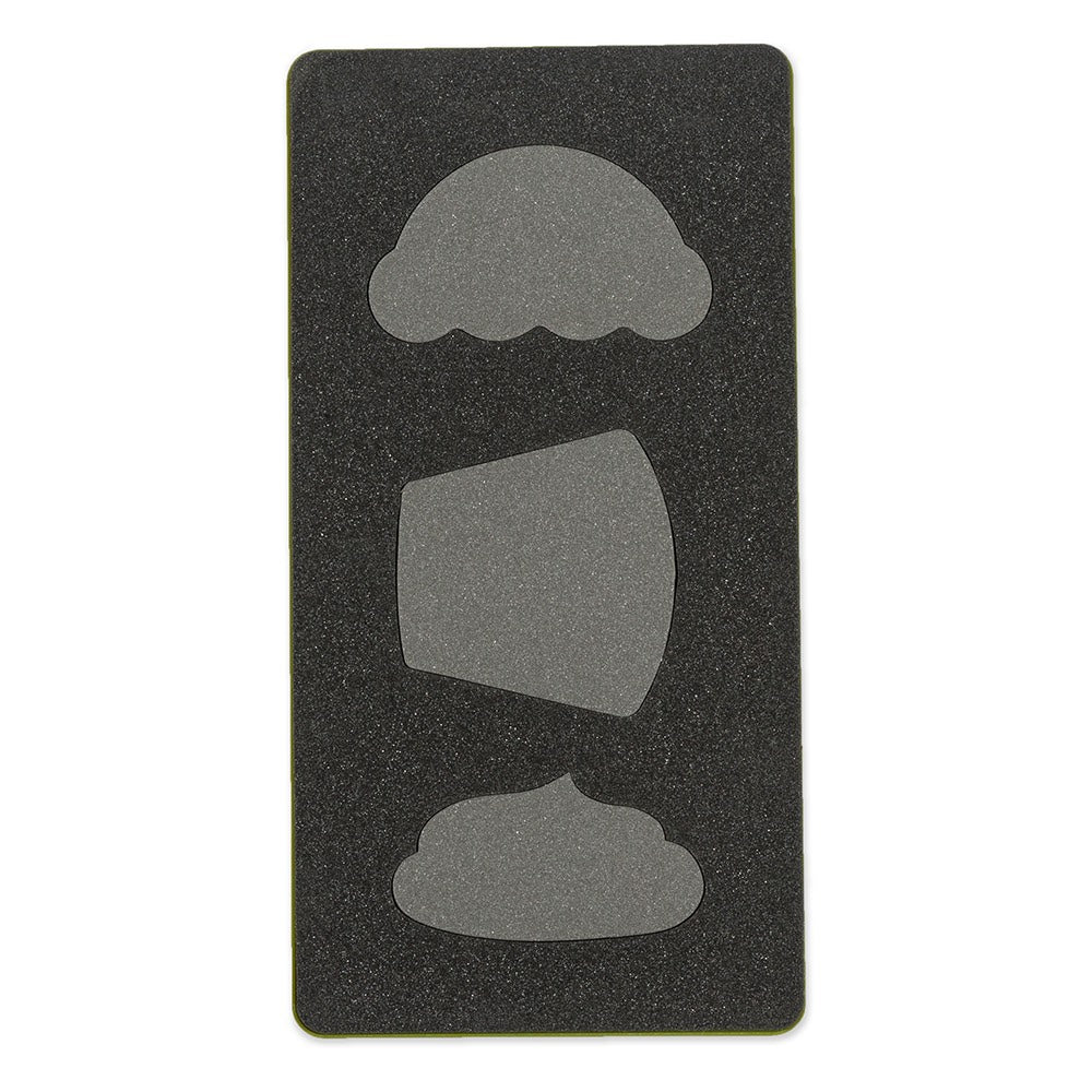 AccuQuilt GO! Cupcake cutting die shown flat with the icing, wrapper and dollop shapes