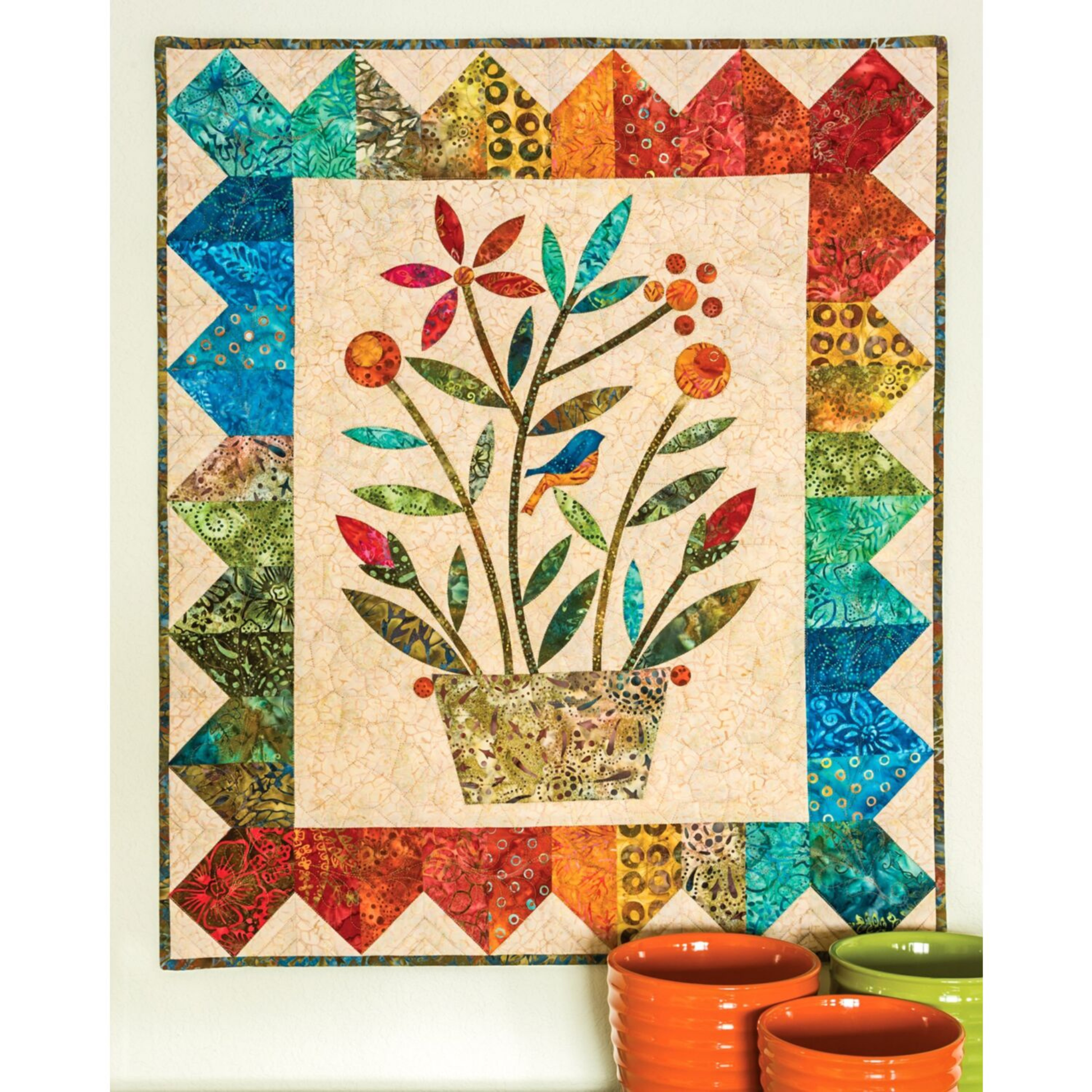 AccuQuilt GO! Simple Shapes potted flower wall hanging with a colourful pieced triangle border