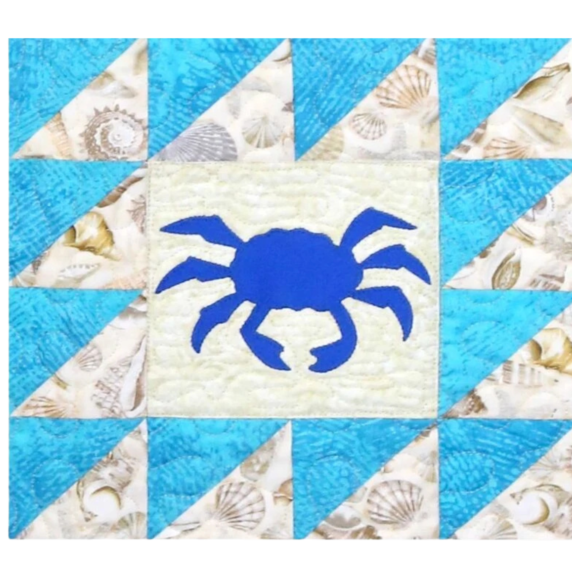 AccuQuilt GO! Sea Life Medley navy crab appliqued on cream, with a turquoise and shell pieced border