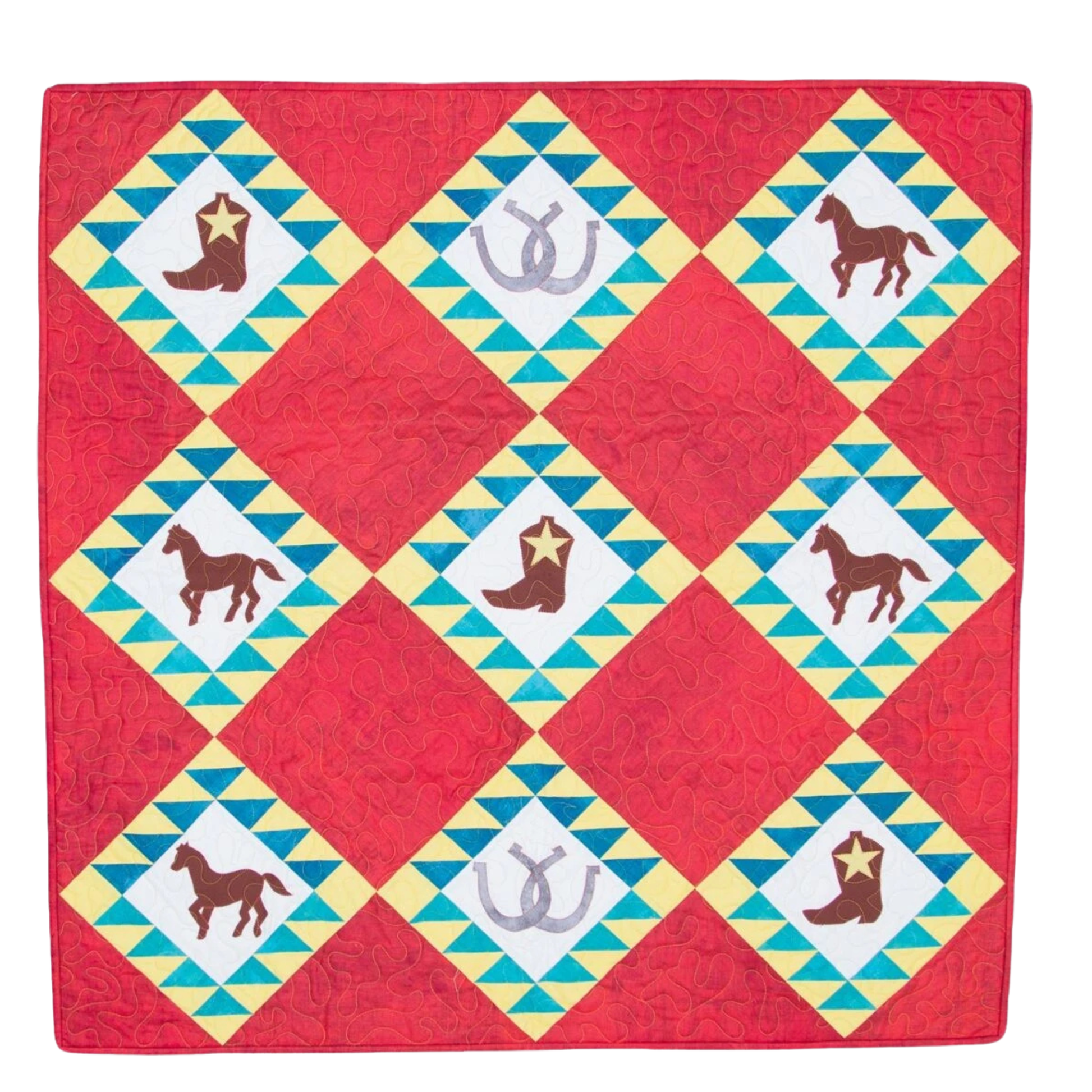 AccuQuilt GO! Western Medley boots, horseshoes and horses on a red and turquoise diamond quilt