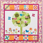 AccuQuilt GO! Crazy Petals forming a green circle tree with birds, butterflies and a pieced star border