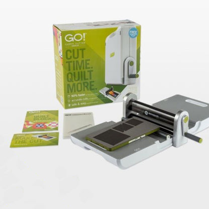 Quilting cutter with packaging and accessories on a white background