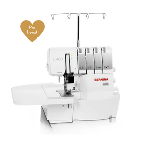 Bernina L460 overlocker pre-loved front view on white - thread spool holders on top and Pre-Loved certification badge