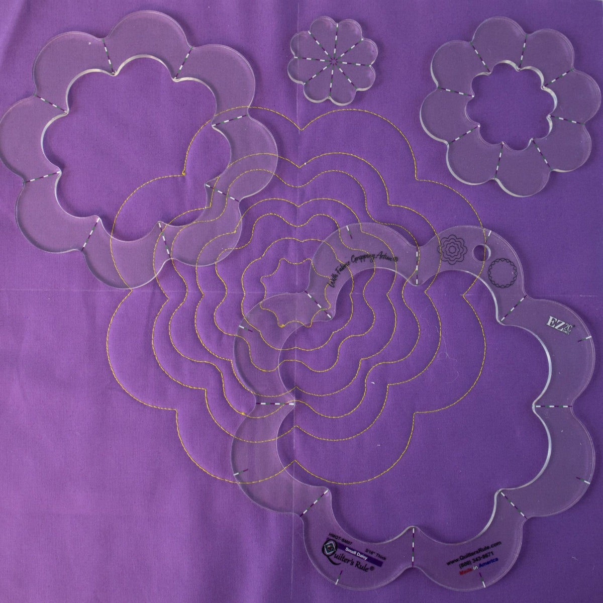 Daisy sample on purple fabric