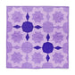 Completed quilt wall hanging made using the AccuQuilt GO! Double Star Block on Board die, featuring a repeating double star pattern in tonal lavender and deep purple dotted fabrics with decorative quilting