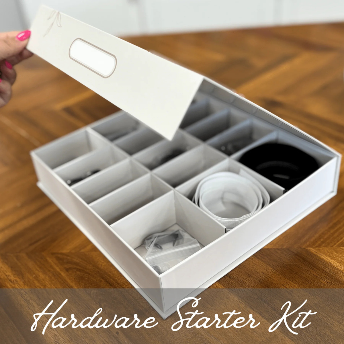 Emmaline Premium Hardware Starter Kit open on wooden floor showing silver bag hardware in compartments