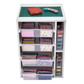 Drawers with colourful fabrics and cutting mat on top surface