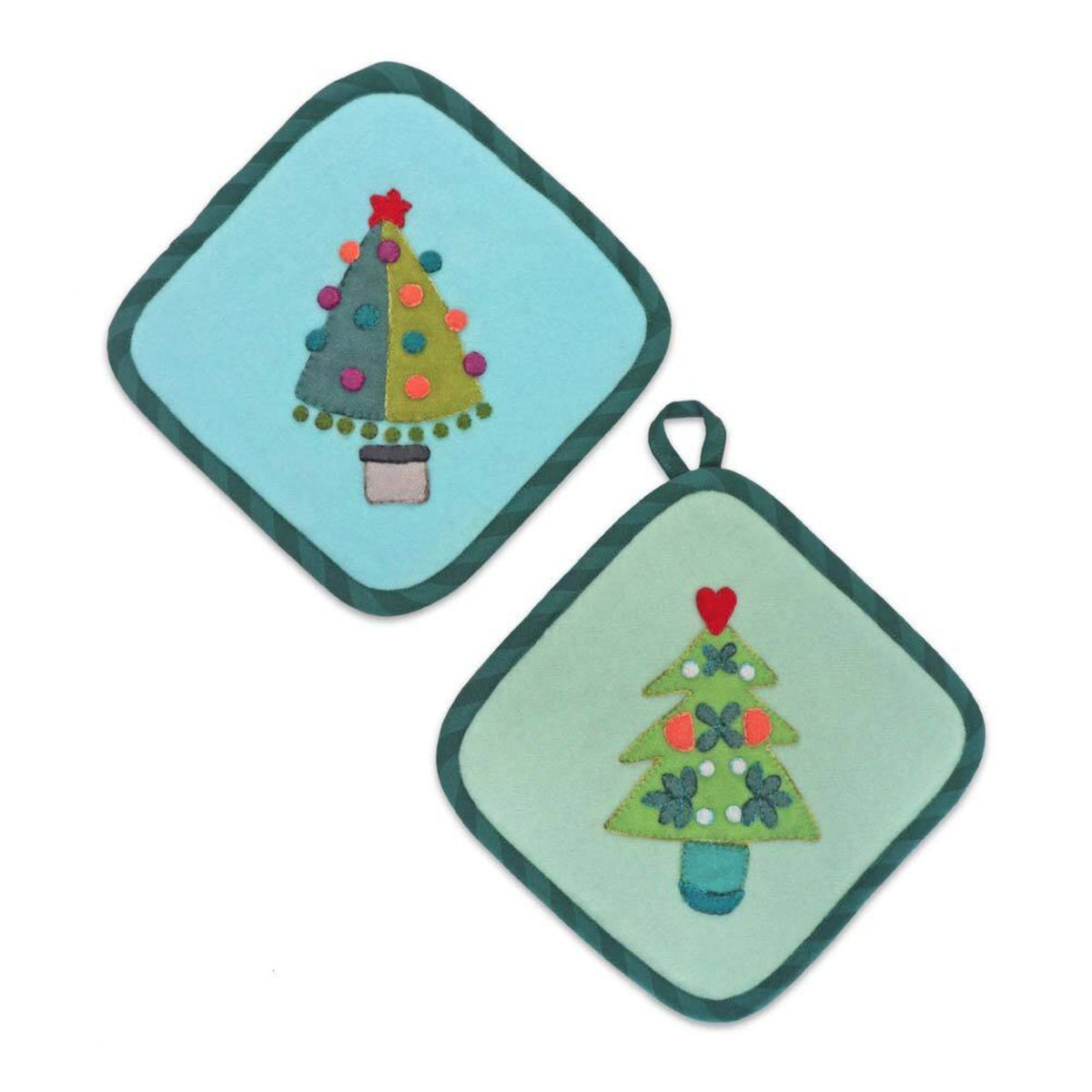 Two pastel potholders with dark green binding and decorated Christmas tree appliqués made with the AccuQuilt GO! Tinsel die by Sue Spargo.
