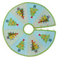 Circular pastel tree skirt with green binding and eight decorated Christmas tree appliqués made using the AccuQuilt GO! Tinsel die by Sue Spargo