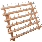 June Tailor solid wood cone thread rack with 33 spindles, shown upright on tabletop