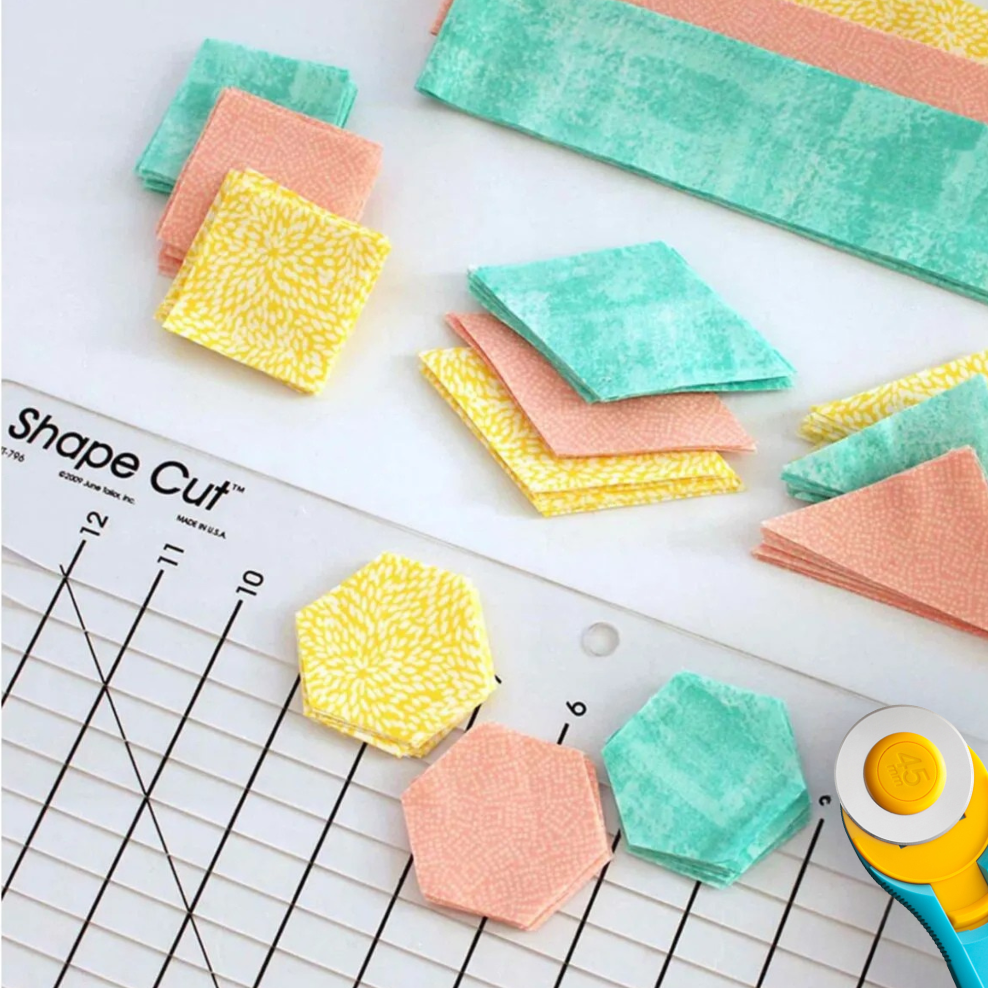 une Tailor Shape Cut ruler for cutting squares, triangles, hexagons and more from fabric