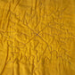 Leaf sample on gold fabric