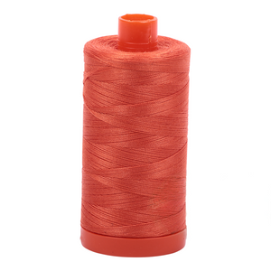 Aurifil embroidery thread spool in Dusty Orange (1154) - 50wt 1300m