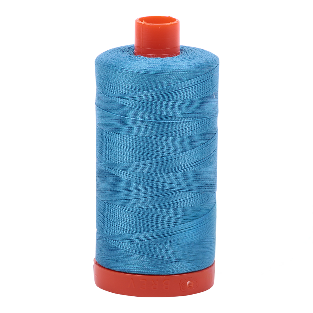 Aurifil embroidery thread spool in Bright Teal (1320) - 50wt 1300m