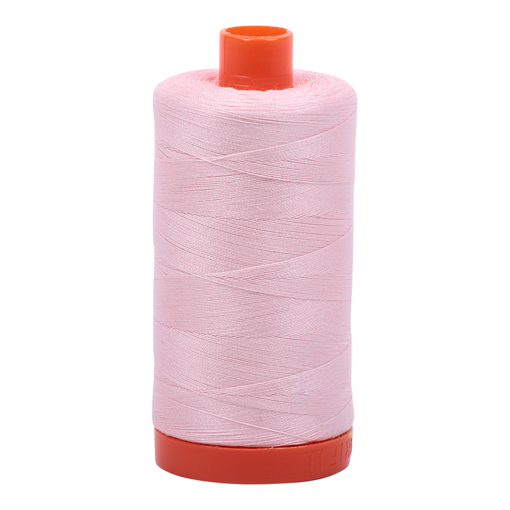 Aurifil embroidery thread spool in Pale Pink (2410) - 50wt 1300m