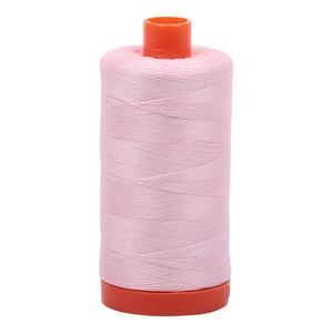 Aurifil embroidery thread spool in Pale Pink (2410) - 50wt 1300m