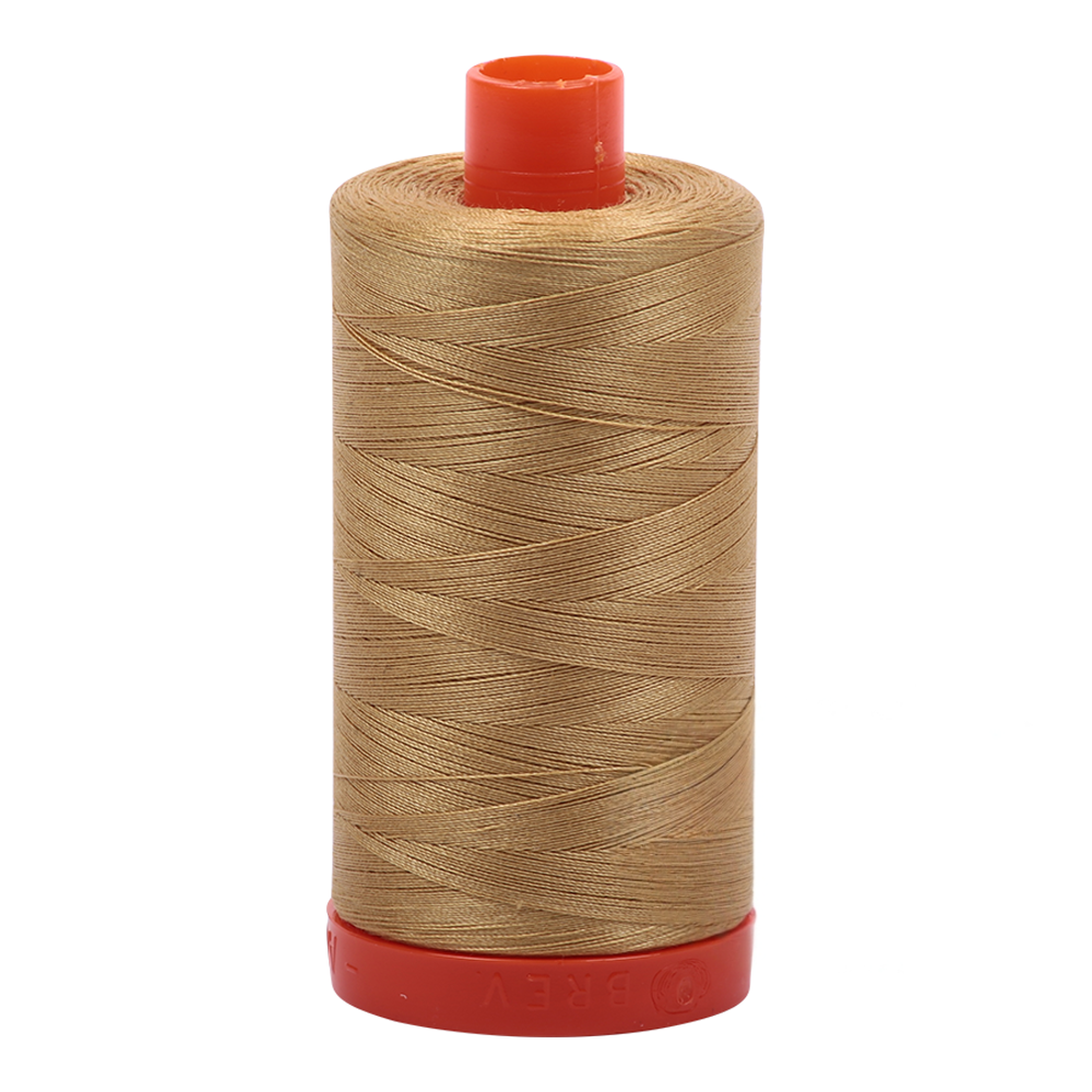 Aurifil embroidery thread spool in Light Brass (2920) - 50wt 1300m