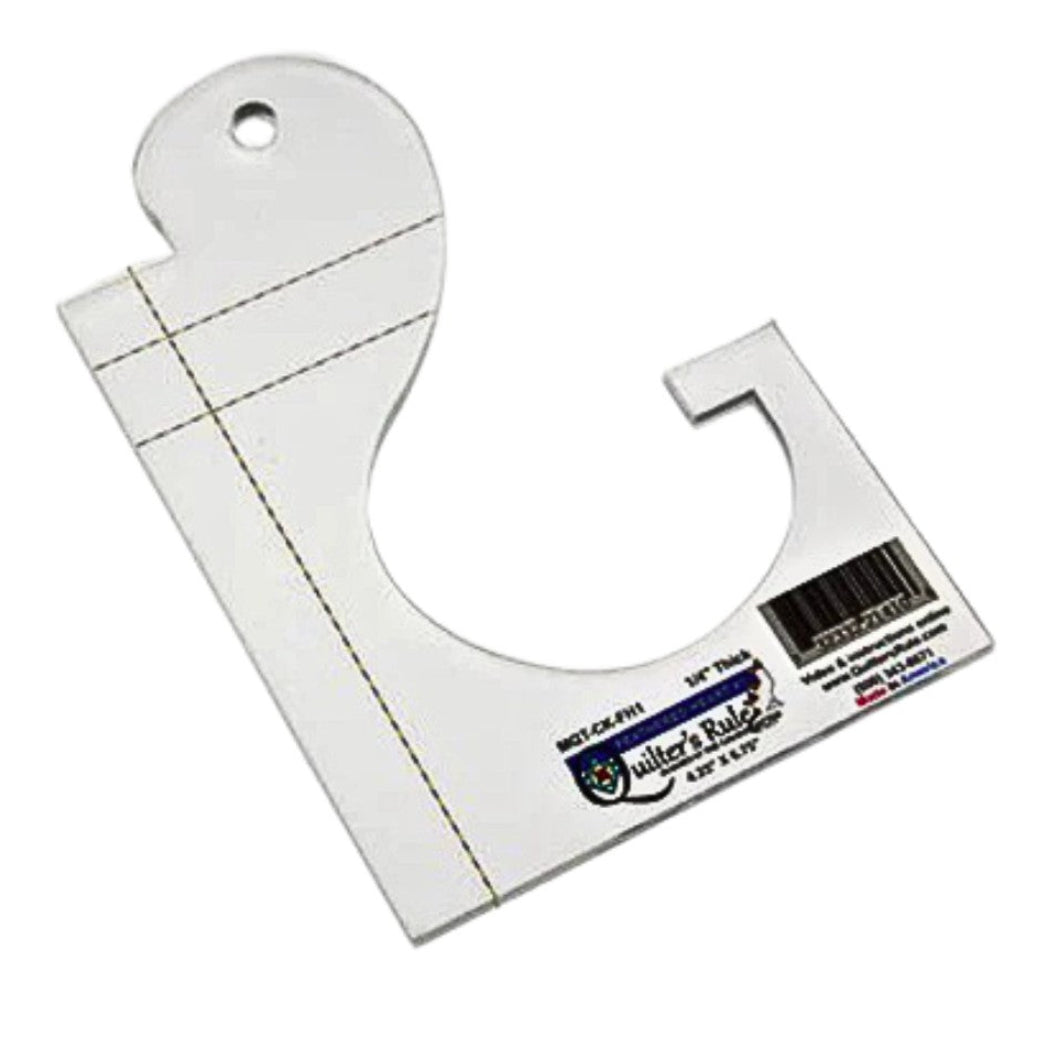Clear plastic square shaped  quilting template with half heart cut out and a curved tail for filling triangular spaces  when creating heart motifs. There are easy to see registration marks  and a non slip backing that provides a fabric gripping action. 