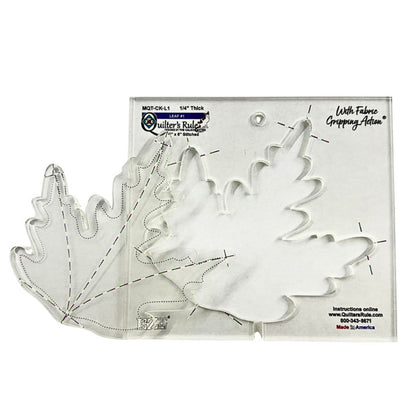Clear plastic square shaped quilting template with a leaf shaped cut out. It  has clear registration marks that are easy to see, and a non slip backing that provides a fabric gripping action.