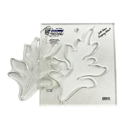 Clear plastic square shaped quilting template with a leaf cut out. Clear registration marks that are easy to see, and a non slip backing that provides a fabric gripping action.
