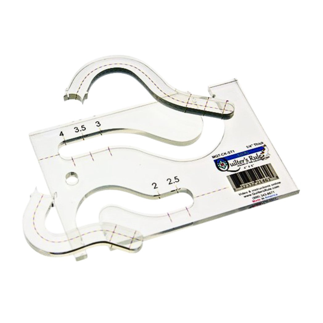 Clear plastic rectangular template with two curved cutouts to create elegant swirl patterns in 2 or 4 inch blocks. It has clear registration marks that are easy to see and a non slip backing that gives it a fabric gripping action.