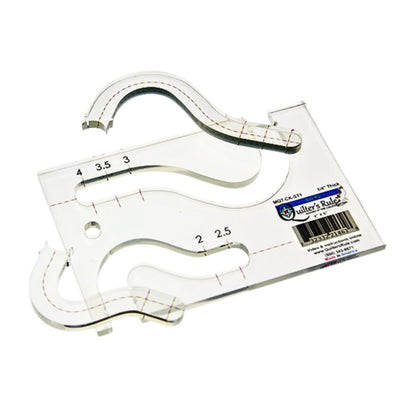 Clear plastic rectangular template with two curved cutouts to create elegant swirl patterns in 2 or 4 inch blocks. It has clear registration marks that are easy to see and a non slip backing that gives it a fabric gripping action.