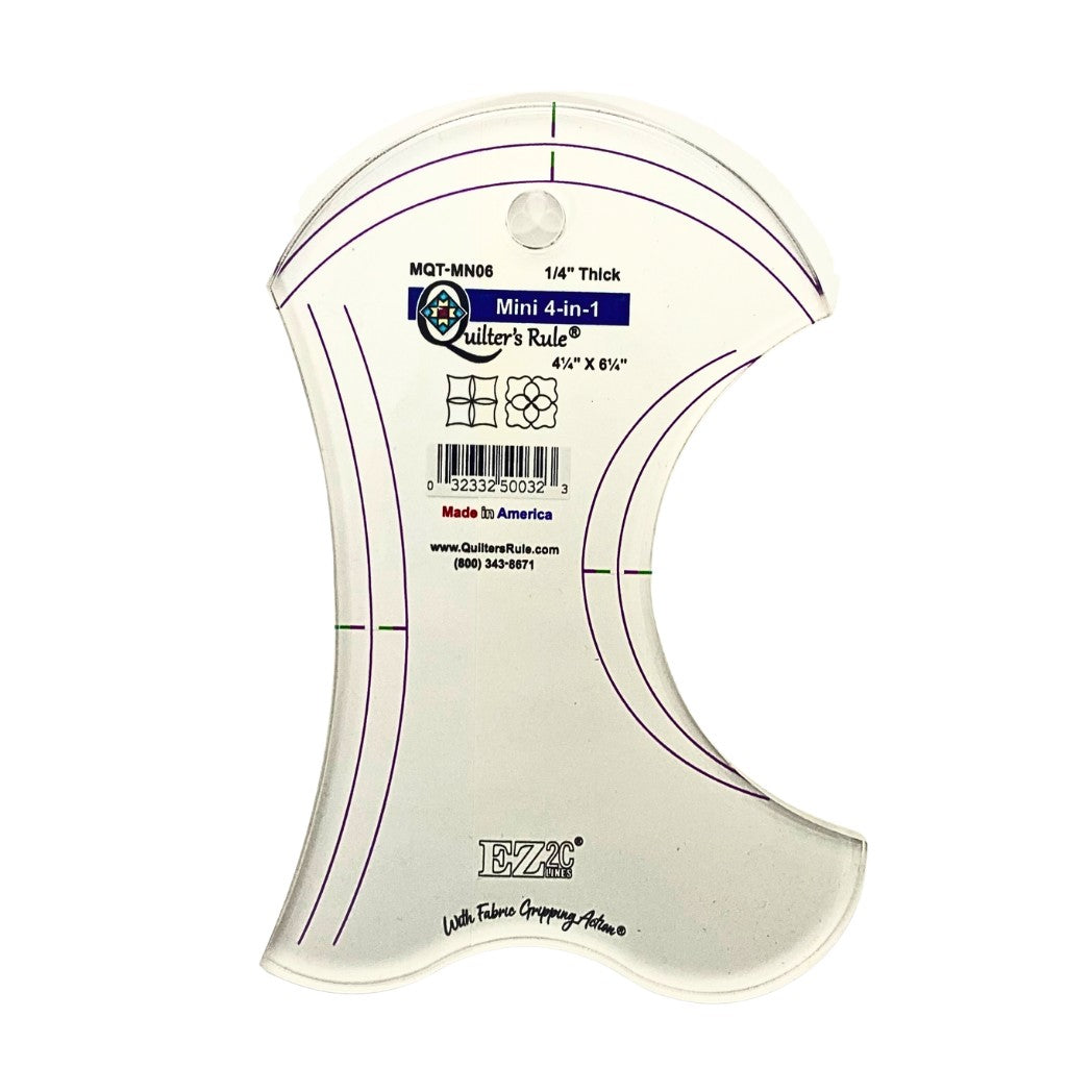 Clear, plastic 4-in-1 quilting tool with two concave curves, one convex curve and one wave curve. It has registration marks that are easy to see. A non slip backing gives it fabric gripping action.