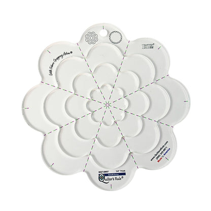 Clear plastic daisy shaped quilting template with registration marks that are easy to see. A set of nested templates lets you make four different daisy sizes, from 2 1/8 inches up to 8 5/8 inches. A non slip backing gives it a fabric gripping action.