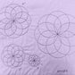 Nested mini circles sample on white fabric