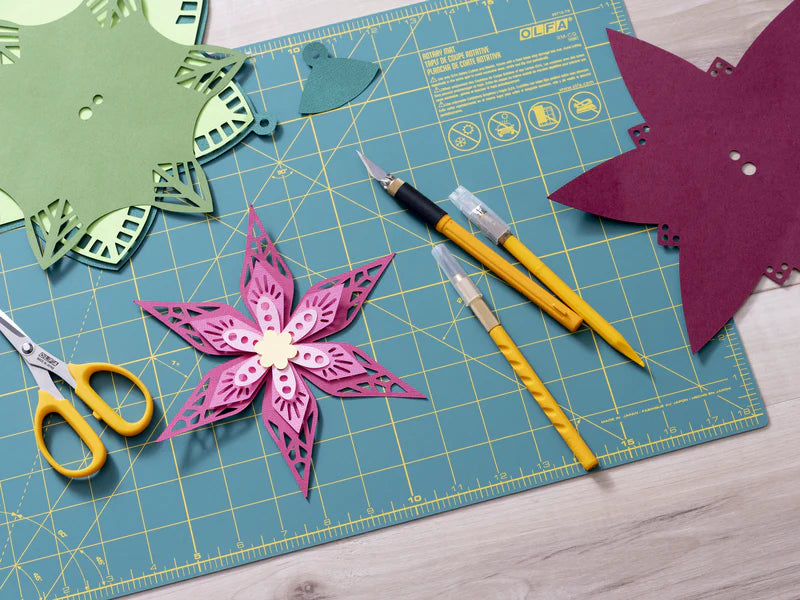 Olfa AK-1 Craft and Art Knife  being used for paper cuts