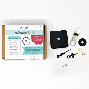 OESD Clock Kit components laid out including hands motor and metal hook