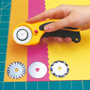 Olfa 45mm Rotary Cutter Curved Handle showing alternative style blades, pinking and wave.