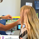 Person having private tuition on a Bernina sewing machine