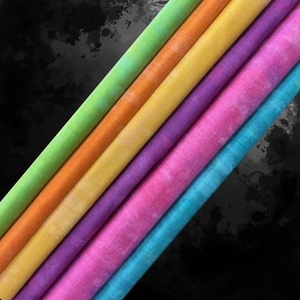 Colourfulbolts of fabric arranged diagonally on a dark textured background