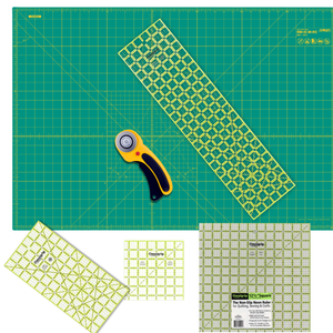 Deluxe Rotary Cutting Starter Kit contents: Olfa 45mm curved rotary cutter, Olfa cutting mat, and Omnigrip rulers
